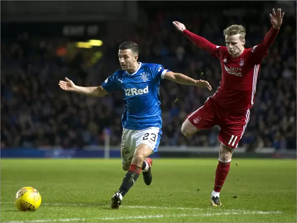 Ibrox Clash: Holt Fouls by Mackay-Steven - Ladbrokes Premiership Showdown at Rangers
