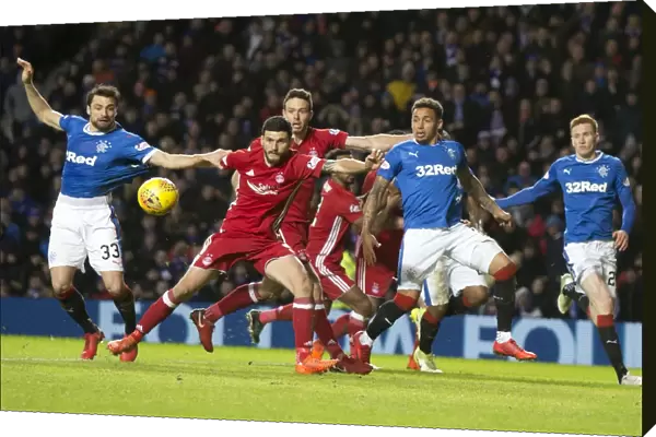 Intense Rivalry: Martin and Tavernier Battle for the Ball in Rangers vs Aberdeen's Premiership Clash at Ibrox Stadium