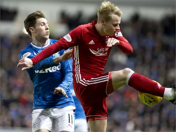 Intense Clash: Windass vs Mackay-Steven at Ibrox Stadium (Rangers vs Aberdeen, Scottish Premiership)