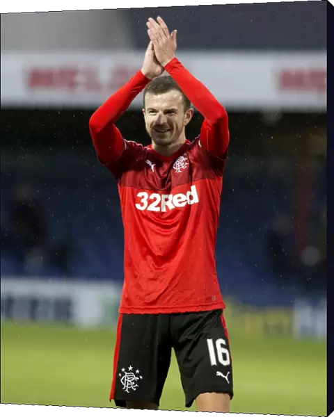 Rangers Andy Halliday Celebrates Premiership Victory at Ross County: Salute to the Fans