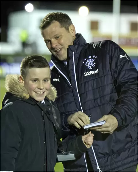 Rangers Manager Graeme Murty Examines Unique Fan's Haircut at Scottish Cup Match vs Fraserburgh