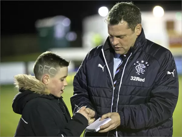 Rangers Manager Graeme Murty Admires Unique Fan's Haircut at Fraserburgh's Bellslea Park During Scottish Cup Match