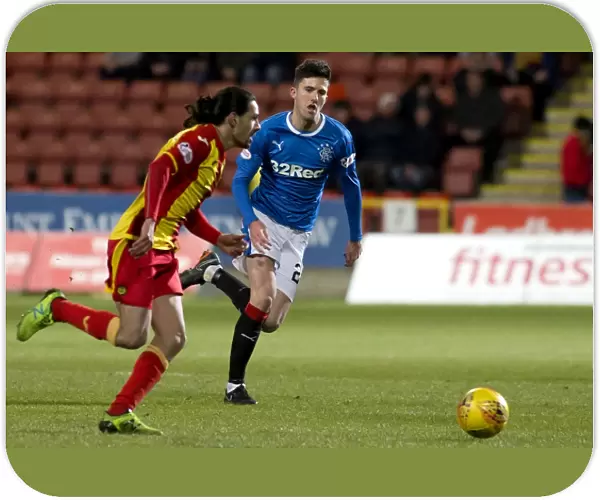 Rangers Sean Goss in Pursuit: Intense Moment Chasing Down the Ball during Ladbrokes Premiership Clash at Firhill Stadium