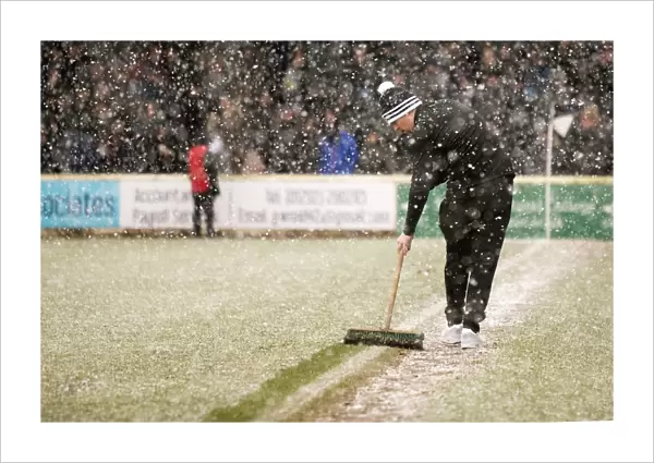 Snowy Half Time: Rangers Clear the Field at Ayr United in the Scottish Cup