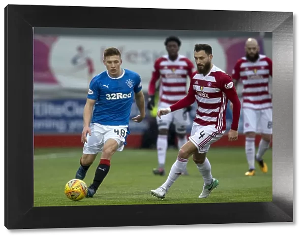 Rangers Greg Docherty in Pursuit: Intense Moment from Ladbrokes Premiership Clash at The SuperSeal Stadium
