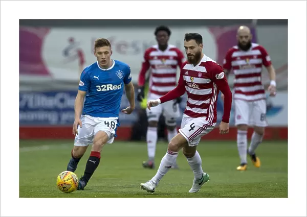 Rangers Greg Docherty in Pursuit: Intense Moment from Ladbrokes Premiership Clash at The SuperSeal Stadium