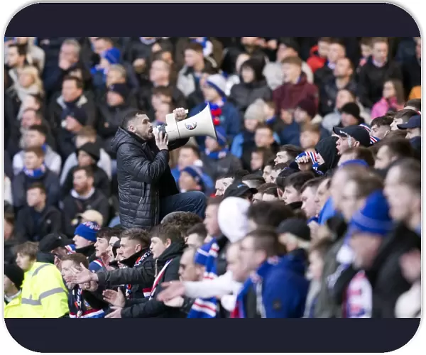 Rangers Fan's Triumphant Roar: Ibrox Stadium's Echoing Cheers During the Scottish Cup Victory (2003)