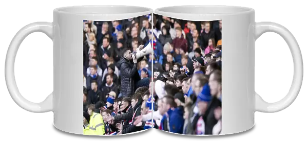 Rangers Fan's Triumphant Roar: Ibrox Stadium's Echoing Cheers During the Scottish Cup Victory (2003)