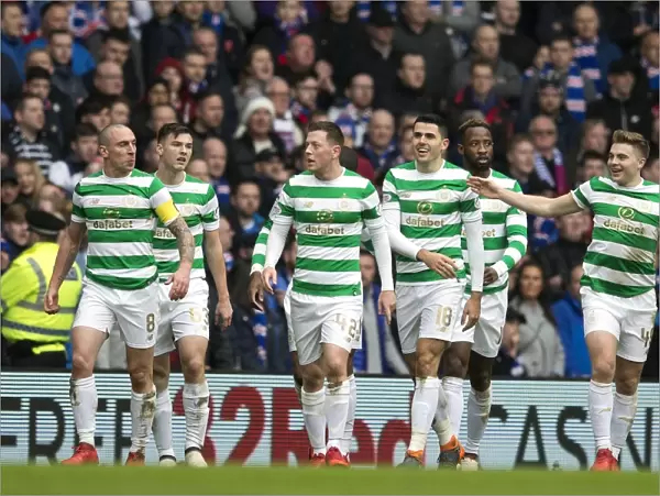 Celtic's Tom Rogic and Rangers Team Mates Celebrate Goal in Intense Ibrox Rivalry