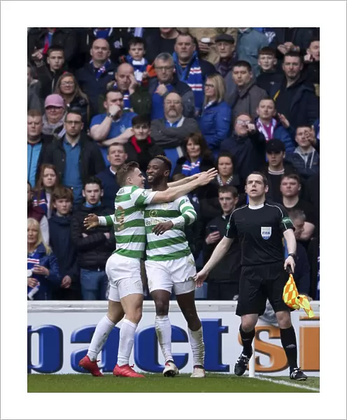 Moussa Dembele and James Forrest: Celebrating Glory Amidst the Intense Ibrox Rivalry