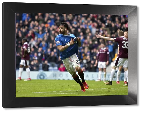 Celebrating with Pride: Daniel Candeias's Glory Goal and Badge Salute at Ibrox Stadium