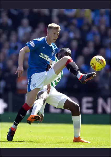 Rangers Ross McCrorie Fights for Possession: Intense Scottish Derby at Celtic Park