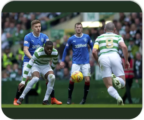 Greg Docherty in Action: Celtic vs Rangers - Intense Battle for the Ball in the Ladbrokes Premiership Clash at Celtic Park