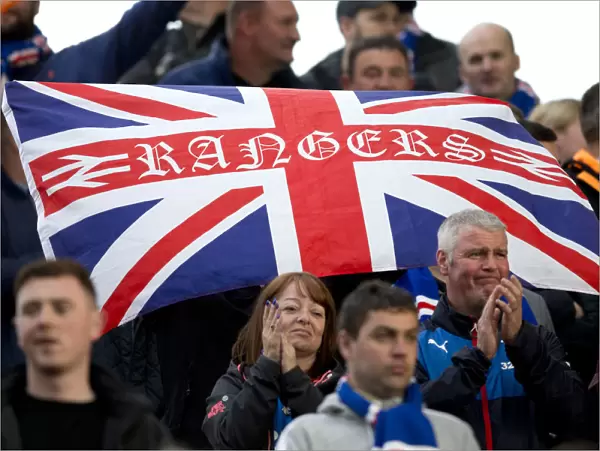 A Sea of Passion: Rangers Fans Unite in Triumph at Pittodrie Stadium (2003)