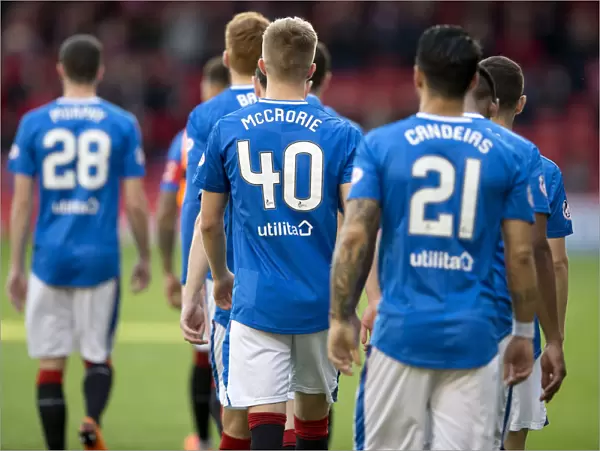 Rangers Players Emerging for Ladbrokes Premiership Showdown at Pittodrie Stadium: Scottish Cup Champions Face Off Against Aberdeen