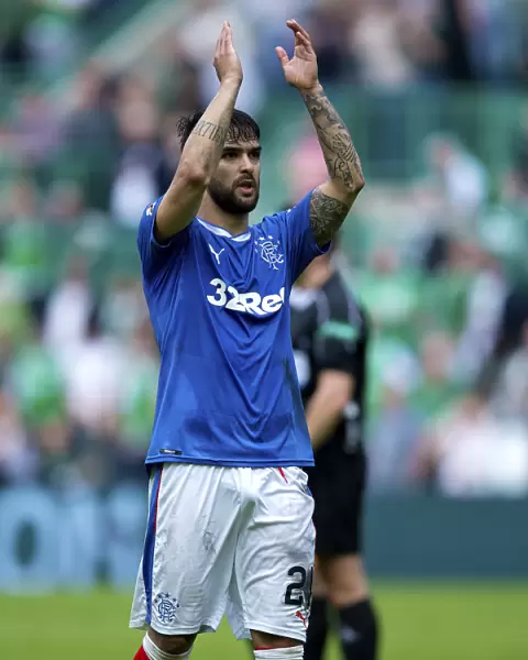 Rangers Daniel Candeias: Celebrating Premiership Victory with Fans at Easter Road