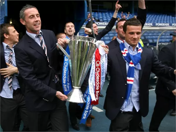 Rangers Football Club: Champions League Victory - Barry Ferguson and David Weir Celebrate with the Trophy at Ibrox (2008-09)