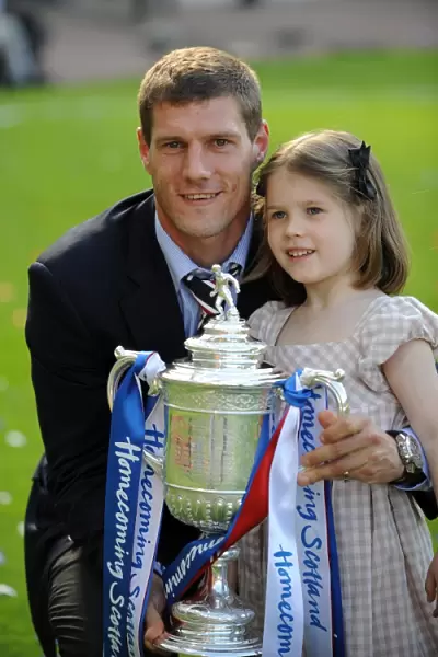 Rangers Football Club: Andrius Velicka and Daughter Rejoice in Homecoming Scottish Cup Victory (2009)