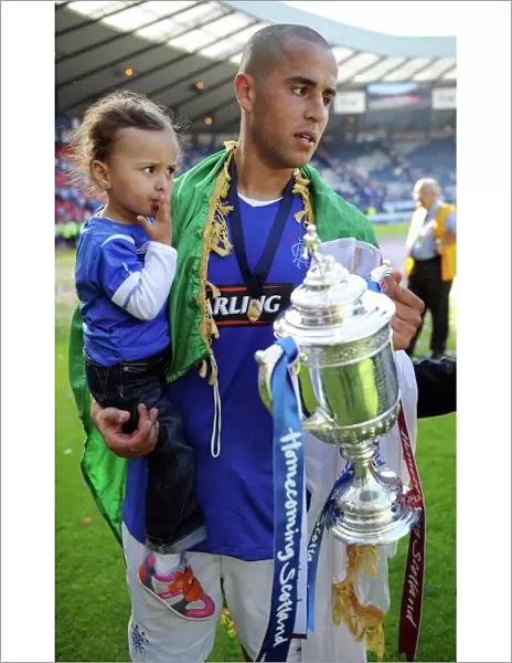 Rangers Football Club: Majid Bougherra and Daughter Rejoice in 2009 Homecoming Scottish Cup Victory at Hampden Park