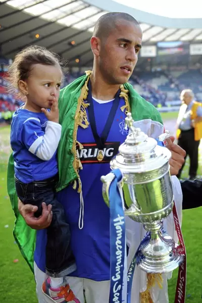 Rangers Football Club: Majid Bougherra and Daughter Rejoice in 2009 Homecoming Scottish Cup Victory at Hampden Park