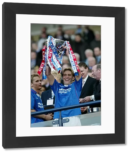 Rangers Triumph Over Celtic: A 2-1 Victory (March 16, 2003)
