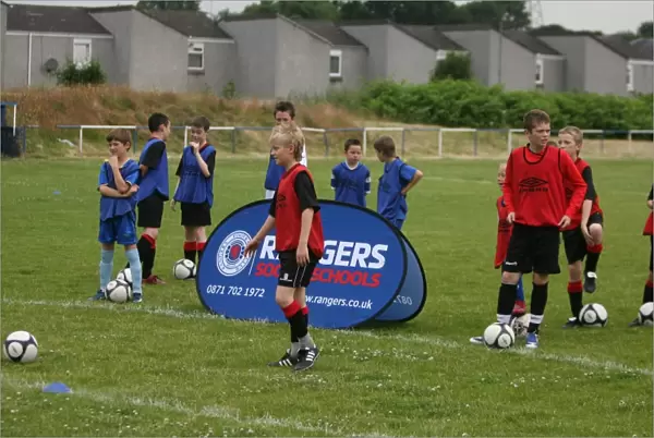 Rangers Soccer School Summer Roadshow at Renfrew Juniors FC: Fun and Skills Development with Rangers FC