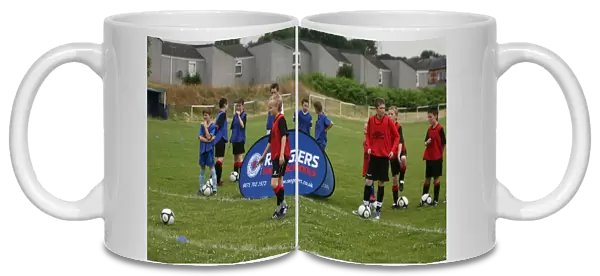Rangers Soccer School Summer Roadshow at Renfrew Juniors FC: Fun and Skills Development with Rangers FC