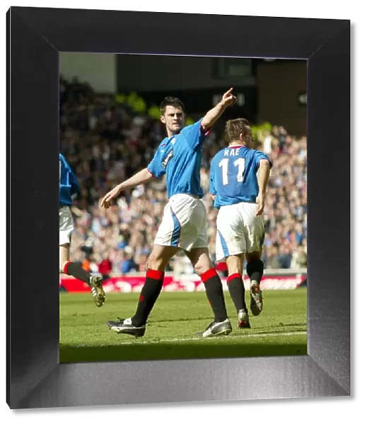 Thrilling Rivalry: Steven Thompson Scores the Decisive Goal for Celtic over Rangers (28 / 03 / 04) - 1-2