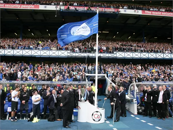 Rangers Football Club: Celebrating Scottish Premier League Championship - Sir David Murray Unveils the Champion Flag at Ibrox Stadium