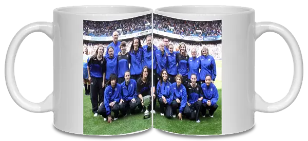 Rangers Ladies Celebrate First Division Title Win: Triumphant Moment with the Trophy at Ibrox Stadium