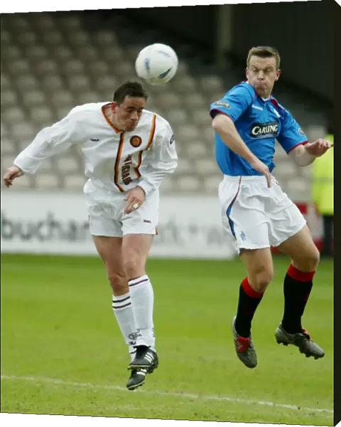 Moment of Triumph: Gavin Rae and Phil O'Donnell Secure Rangers Win Against Motherwell (04 / 04 / 04)