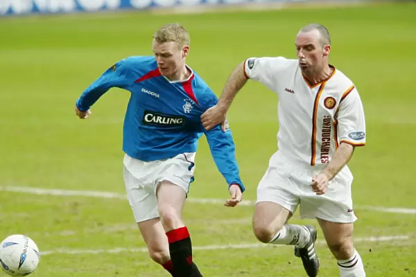 Determined Michael Ball Stands Firm: Rangers Triumph Over Motherwell, 04 / 04 / 04