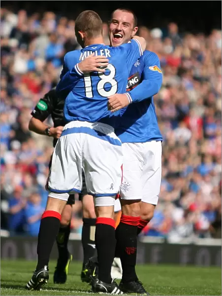 Rangers Kris Boyd and Kenny Miller: Unstoppable Duo Celebrates 4-1 Victory over Hamilton (Clydesdale Bank Premier League)