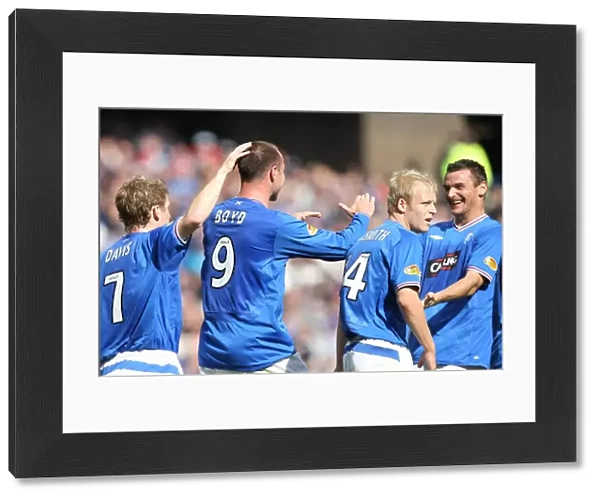 Rangers: Kris Boyd and Teammates Celebrate Euphorically After His Goal Against Hamilton (4-1) in the Clydesdale Bank Premier League at Ibrox