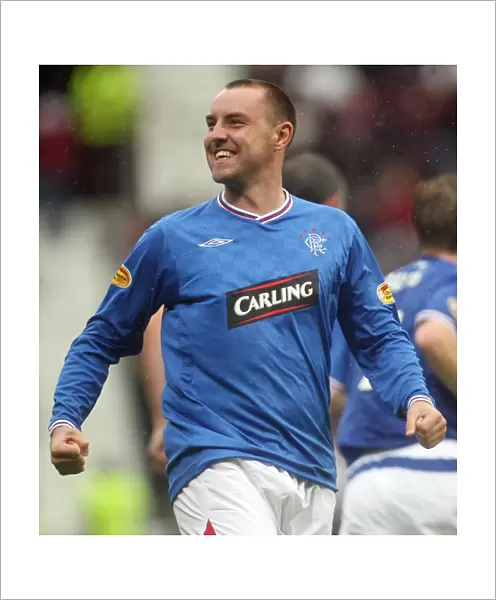 Rangers Kris Boyd: The Thrill of Victory - Celebrating the Winning Goal Against Hearts in the Scottish Premier League at Tynecastle Stadium (1-2)