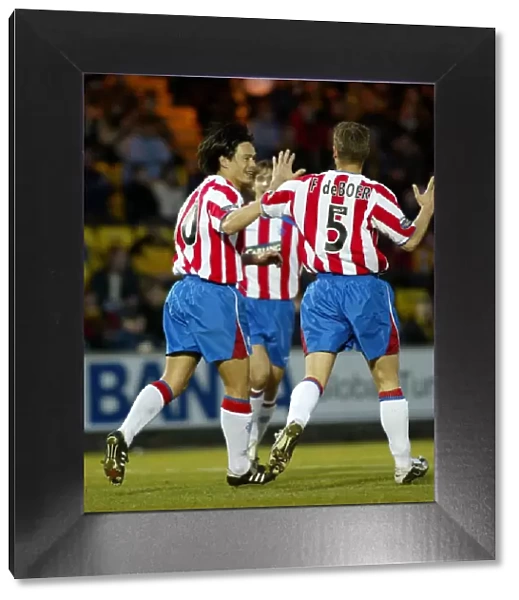 Michael Mols and Frank de Boer: Rangers Football Club's Unforgettable Draw Celebration - April 14, 2004