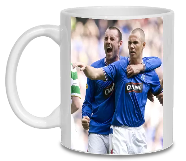 Rangers Double Delight: Miller and Boyd Celebrate Glory at Ibrox (2-1 vs Celtic)