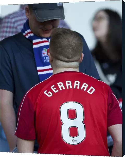 Rangers Fan in Liverpool's Steven Gerrard Shirt: A Unique Tribute at Ibrox Stadium During the Pre-Season Friendly vs Bury (Scottish Cup Winning Moment)