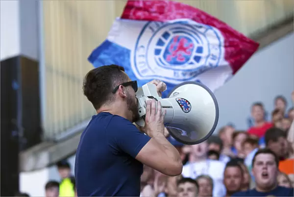 Rangers Fan with Loudspeaker: Celebrating Scottish Cup Victory at Ibrox Stadium (2003)