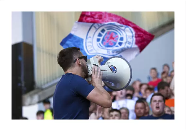 Rangers Fan with Loudspeaker: Celebrating Scottish Cup Victory at Ibrox Stadium (2003)