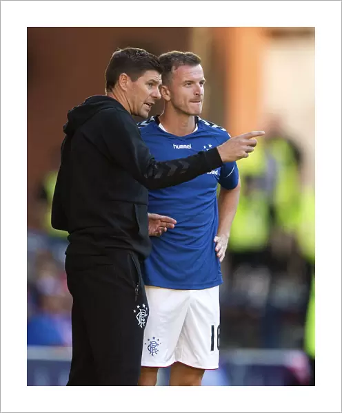 Rangers Manager Steven Gerrard Engages in Deep Discussion with Andy Halliday during Pre-Season Friendly at Ibrox Stadium