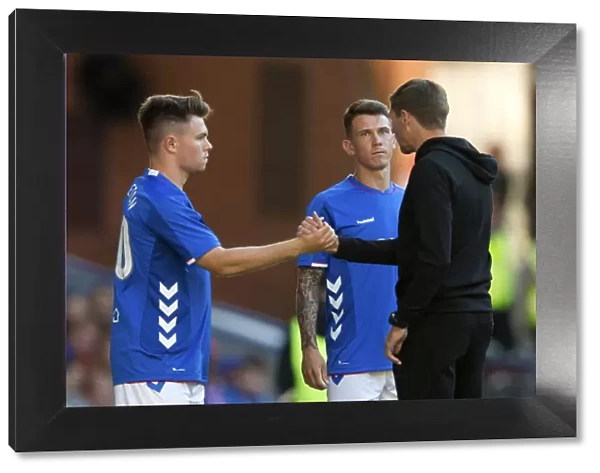 Rangers Manager Steven Gerrard in Deep Consultation with Glenn Middleton and Ryan Jack at Ibrox Stadium