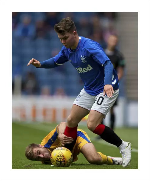 Rangers vs Wigan Athletic: A Light-Hearted Moment Between Glenn Middleton and Callum McManaman at Ibrox Stadium (2023)