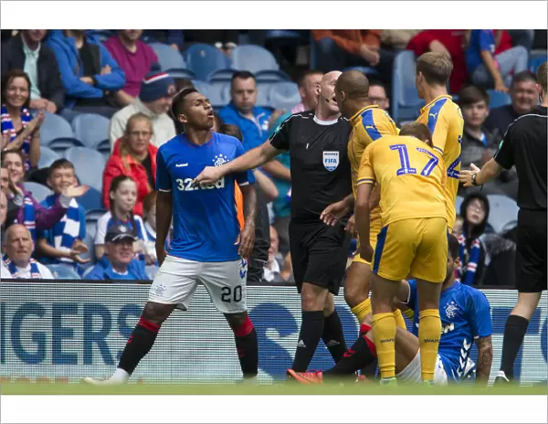 Rangers vs Wigan Athletic: A Heated Clash Between Alfredo Morelos and James Vaughn at Ibrox Stadium