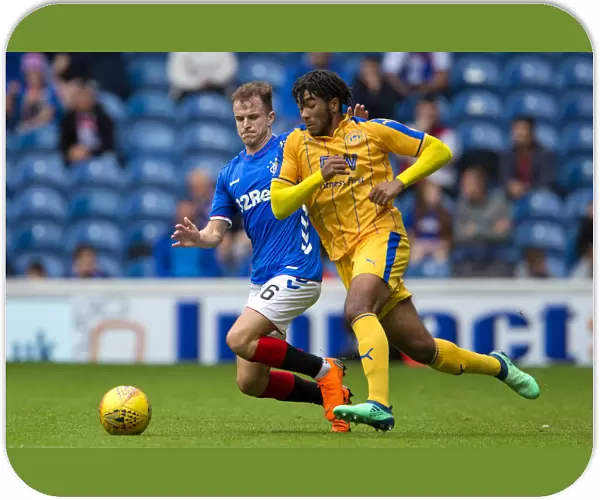 Andy Halliday Fights for the Ball: Rangers vs Wigan Athletic at Ibrox Stadium