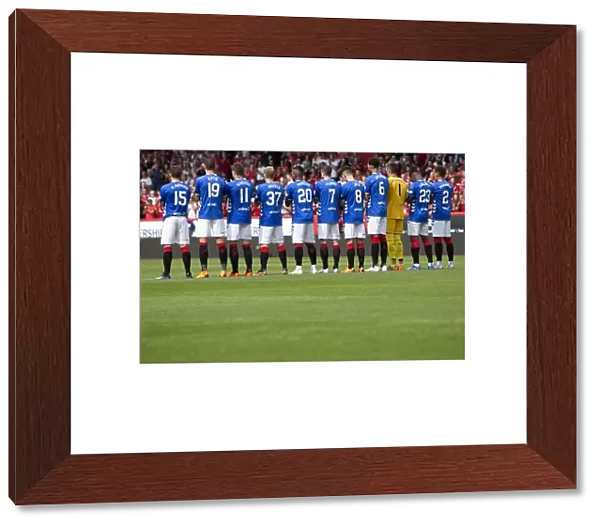 Minutes Applause for Neil Cooper: A Tribute at Pittodrie Stadium during Aberdeen vs Rangers (Scottish Cup Winners 2003)