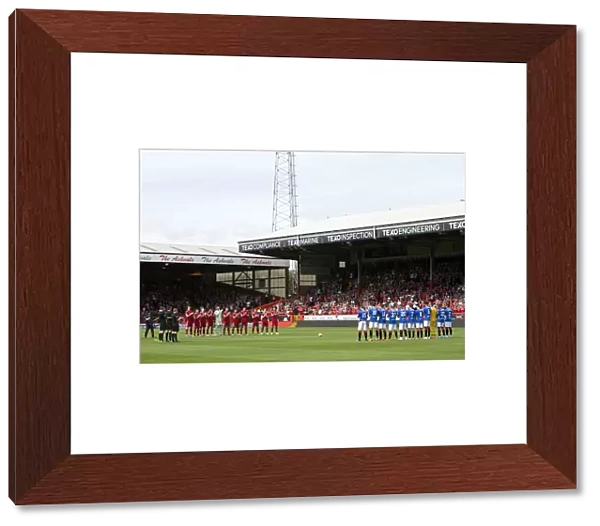 Rangers and Aberdeen Pay Tribute: A Moment of Silence for Neil Cooper at Pittodrie Stadium