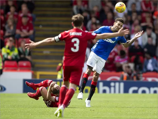Goldson Fouls Anderson: Intense Moment in Rangers vs Aberdeen Ladbrokes Premiership Clash at Pittodrie Stadium