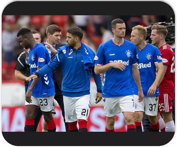Rangers: Steven Gerrard and Lassana Coulibaly Celebrate Hard-Fought Victory at Pittodrie Stadium