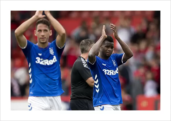 Rangers Lassana Coulibaly Celebrates Aberdeen Victory with Fans at Pittodrie Stadium